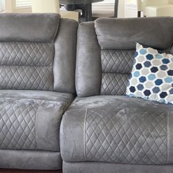 Large Electric Sectional With Storage And Cup Holders.