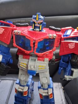 Transformer optimus prime period big transformer , about eleven inches tall