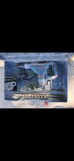 Bosch 11247 10 Amp 1-9/16-Inch Spline Combination Hammer Chisel W/ Carry Case. 2 bits included....asking $175.00