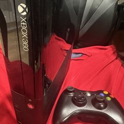 Xbox 360 E console with 16 games