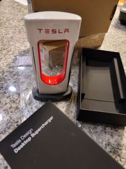 Brand New Authentic Collectable TESLA Metal In Box DESK CHARGER & more items posted here