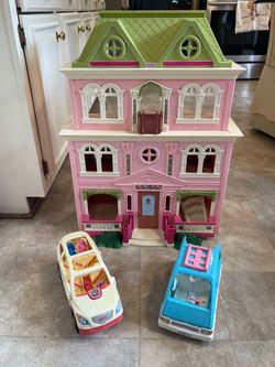 Vintage collectible fisher price doll house with vintage cars