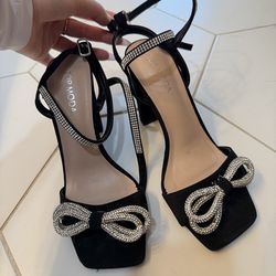 Black and silver heels. Woman size 6.