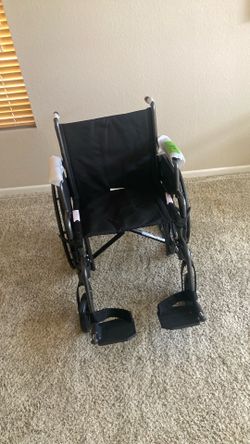 Wheelchair New with 20” Seat and Footrests