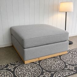 Ottoman with wooden base