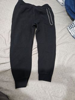 Nike sweatpants.  Black.