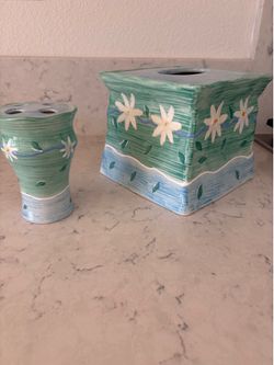 Tissue and toothbrush holders