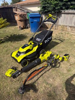 RYOBI 40V  4-Piece Kit featuring a 21-inch Rear-Drive Lawn Mower, Blower, Trimmer, and Hedge Trimmer includes (1) 6Ah Battery and (1) Charger.