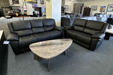 Black sofa and loveseat Recliner