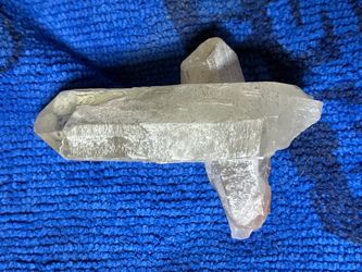 Natural raw  clear quartz crystal specimen in an unusual crossed formation. Double terminated.