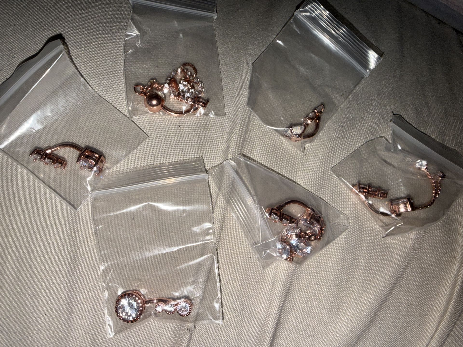 Rose Gold belly button rings.