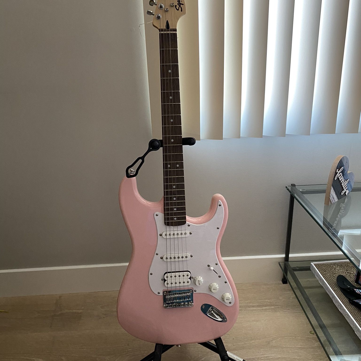 Squier stratocaster pink electric guitar