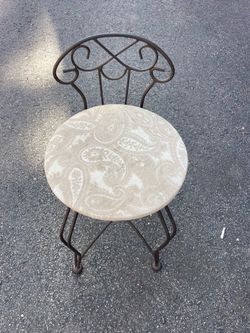 Decorative wrought iron chair....vintage