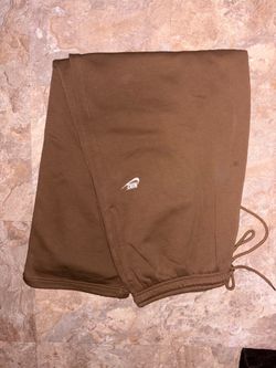 brown nike baggy sweat pants