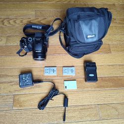 Nikon Coolpix P500 12.1 MP 36.0x Super Wide Optical Zoom + 3 batteries, charger, lens cap, and Nikon bag