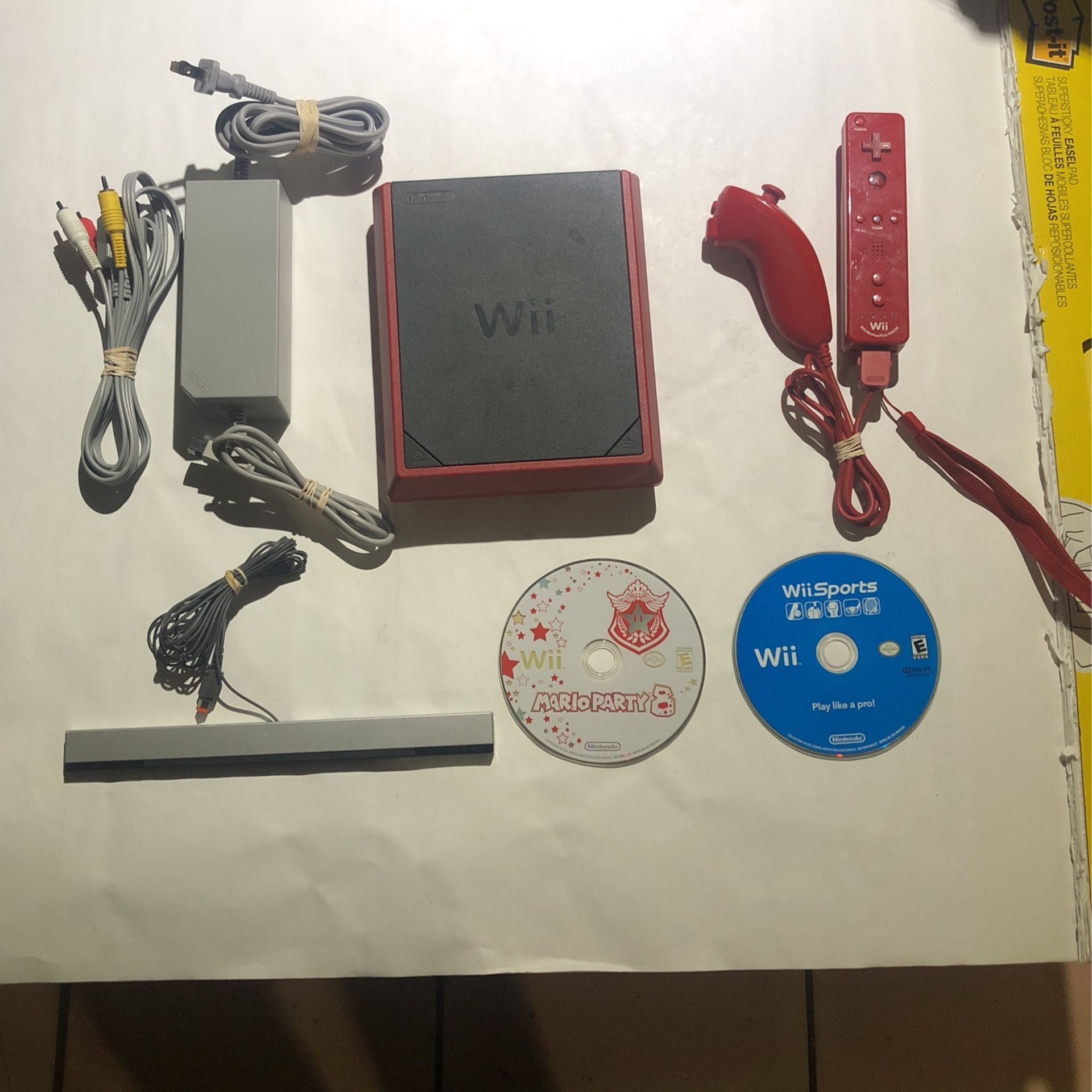 Nintendo Wii Mini + Mario Party 8 & Wii Sports