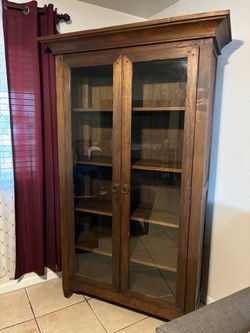 Wood cabinet with glass doors