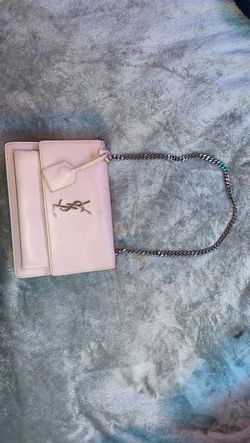 light pink Saint Laurent Sunset smooth leather chain bag featuring silver-tone hardware and the iconic YSL monogram clasp