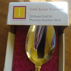 Big Serving Spoon With 24 Karat Gokd /Premium Stainless Steel, Handle  has the gold around It ,brand new.