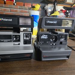 Vintage Polaroid Sun 600 LAND LMS and OneStep instant cameras.