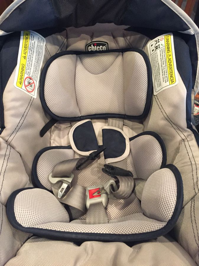 Greco car seat and base with infant insert.