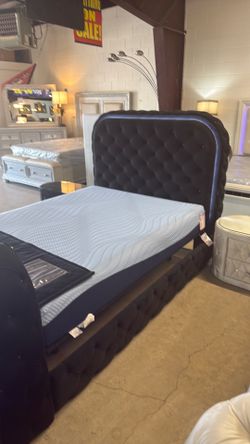Black Tufted Upholstered Bed Frame with Bluetooth and built In fireplace for that ambiance
