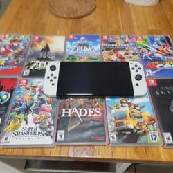 Nintendo Switch OLED And Games (like-new)