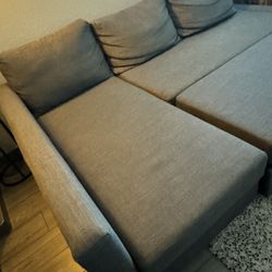 "Modern Gray Sofa with Pull-Out Bed – $200 Only!"