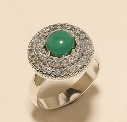 Size 7.5 emerald and topaz in solid sterling silver ring
