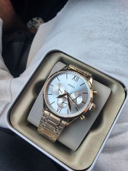 Gold fossil watch
