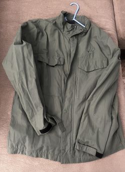Military green Nike coaches jacket