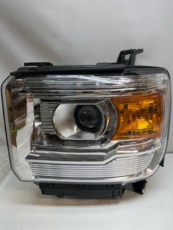 2014 Gmc Sierra 1(contact info removed)  left headlight