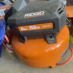 Rigid Air Compressor 6 Gallon Like New With Hose And Attachment’s 