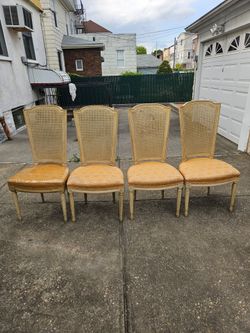 4 cane back chairs