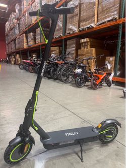 Front and rear shock-absorbing electric scooters