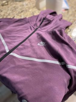 Nike Sportswear Reflective Tech Fleece Hoodie Upgrade your athletic rotation with this sleek and functional Nike zip-up. Combining the lightweight war