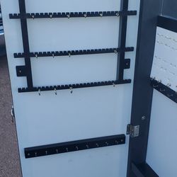 Freestanding jewelry cabinet storage compartment