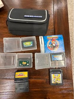 VINTAGE GAMEBOY ADVANCE GAME CARTRIDGES AND CARRYING CASE. ALL IN LIKE NEW CONDITION. $120. OBO.
