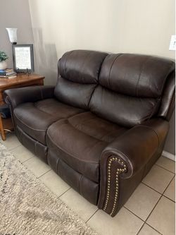 Reclining leather sofa and love sea