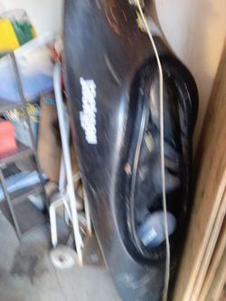 6 foot bad ass kayak with paddle