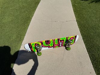 Complete Skateboard with Neon Graphic Deck