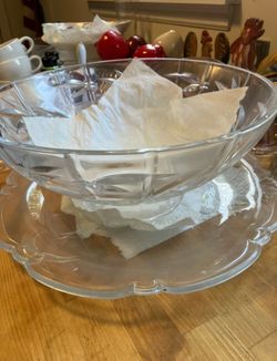 Glass ware.  2 tables full.   10 beautiful platters. 10 great serving bowls.   Cups. Christmas salt pepper.  Angel food cake. Pans. New