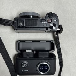 Sony ZV-E10 Camera Body + 3 Batteries + Charging Case + 128GB SD Card