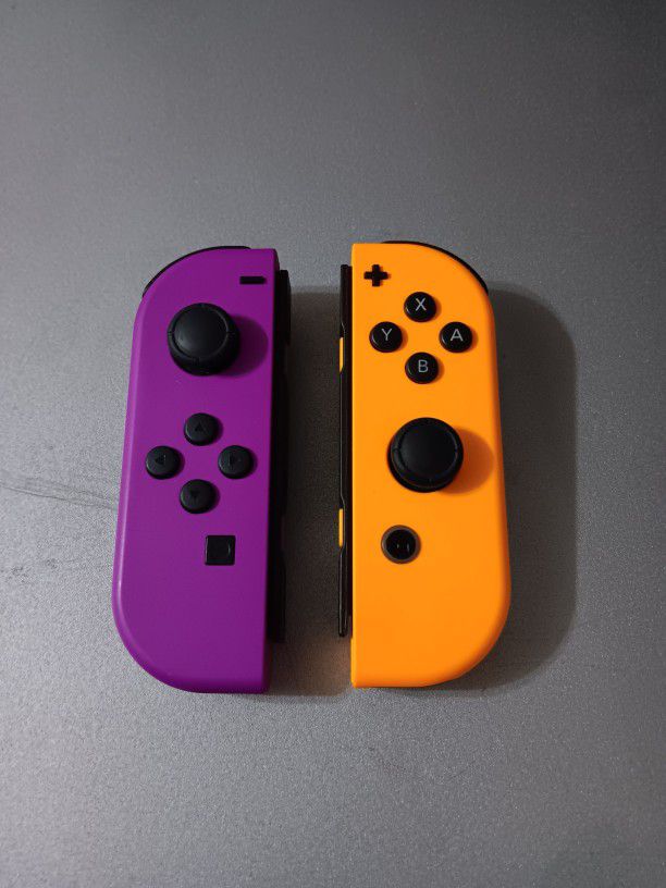 Nintendo Switch Joycons (Purple & Orange)