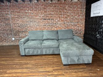 Delivery Available Kendale sleeper sofa with storage chaise retails 1300