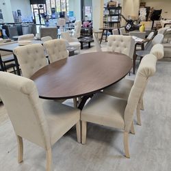 BRAND NEW 
Crossroads 69" Oval Wood Dining Table With 6 Solid Wood Upholstered Dining Chairs Set