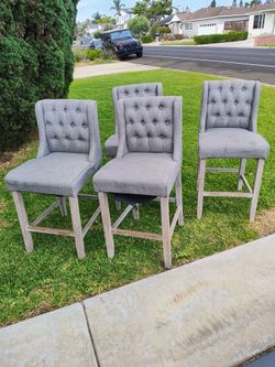 Set of 4 tufted gray bar stools