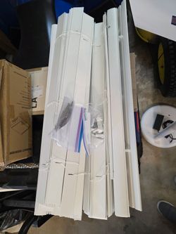Two white pull down blinds from home depot