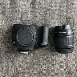 Canon EŌS Rebel T7 DSLR with 18 - 55mm lens (batteries Not Included)