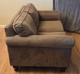 Beige loveseat sofa